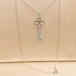 Tiffany & Co. Crown Key pendant platinum and 18k yellow gold, diamond, yellow diamond - Image 2