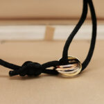 Cartier Trinity bracelet, small model, 18k tri-colour gold, black cord - Image 2