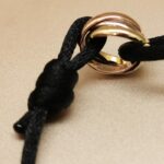 Cartier Trinity bracelet, small model, 18k tri-colour gold, black cord - Image 3