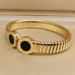 Bvlgari Tubogas bracelet 18k yellow gold, steel,black agate,S - Image 7