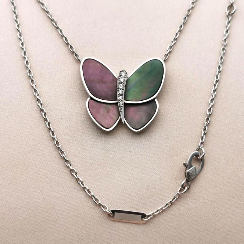 Van Cleef & Arpels Two Butterfly pendant 18k white gold diamond mother of  pearl - Luxury Brand Brokers